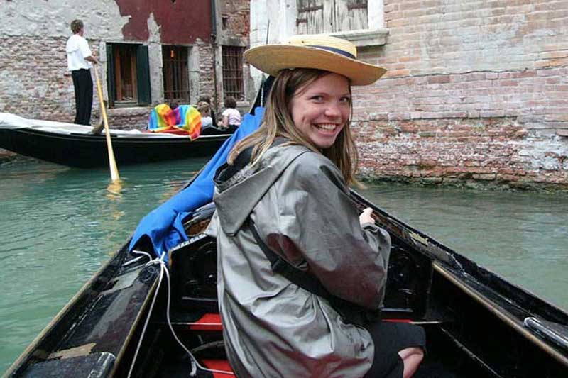 student in gondola in Italy