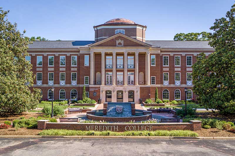 A front view of Johnson Hall and the fountain.