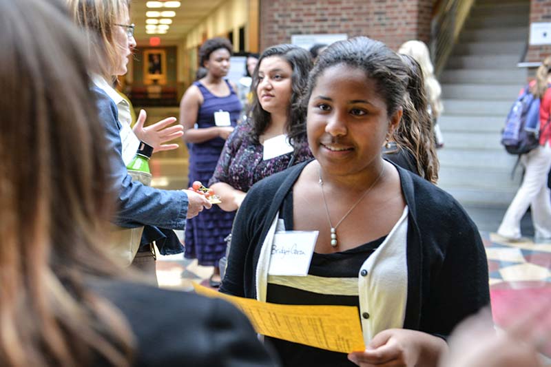 Prospective Student talking to a faculty member