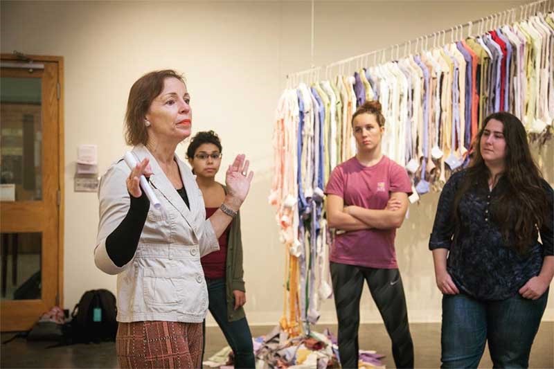 Artist Joyce Watkins King talks about her exhibition, Fast Fashion Fiasco, with Meredith students