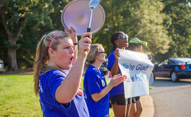 Orientation Crew cheer for new students at Move-In Day