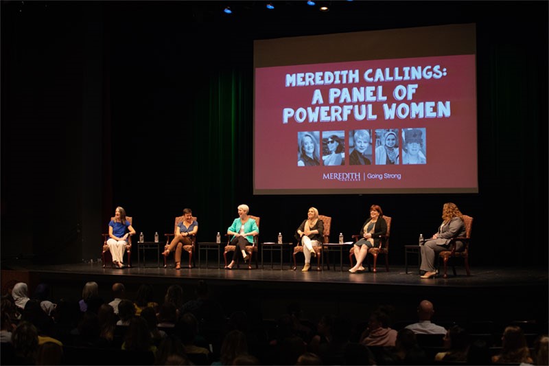 Summer Reading Panel Discussion photo of six women on stage