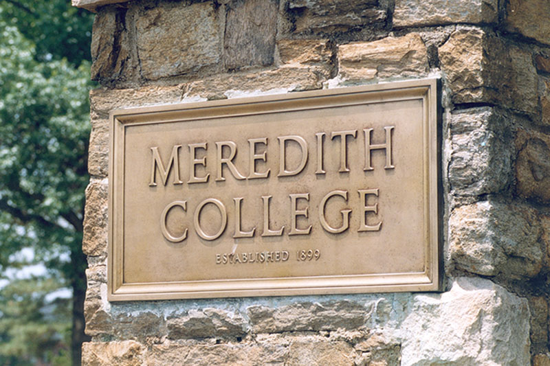 Meredith stone sign at front gate