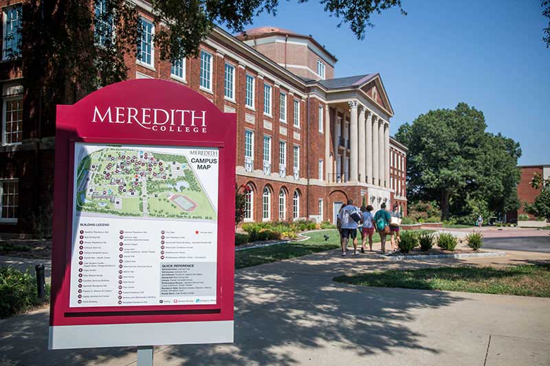Image of Johnson Hall on Meredith's campus with campus map in foreground and the words Meredith College