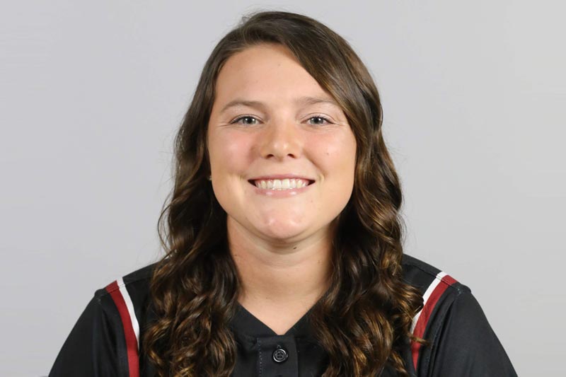 Profile photo of Charley Cox in her softball jersey