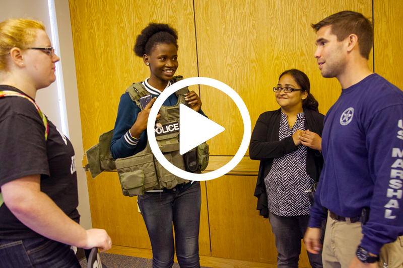 click on image of female students and detective to watch Criminology Video showing the strengths of the major