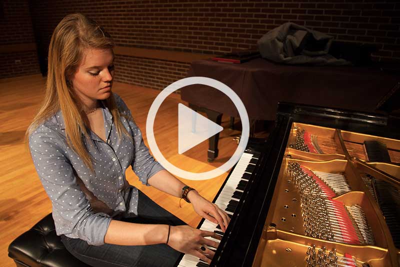 click on image of Erica Rogers playing piano to watch her video in modal