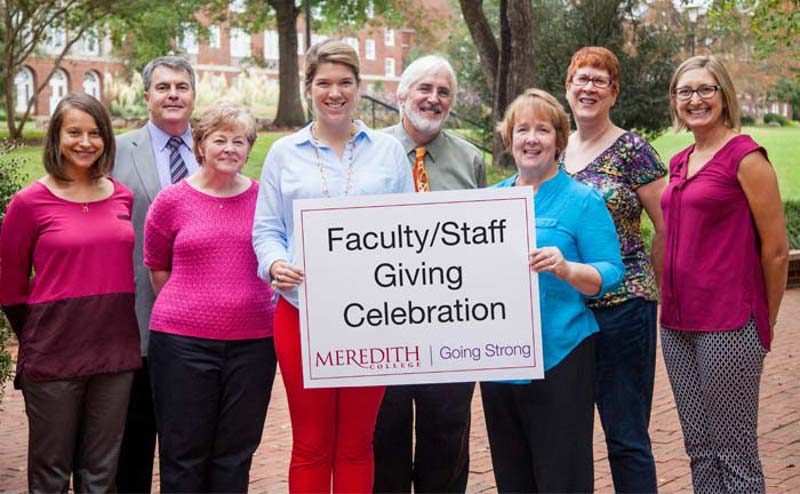 Faculty and Staff Donors with Faculty/Staff Giving Sign