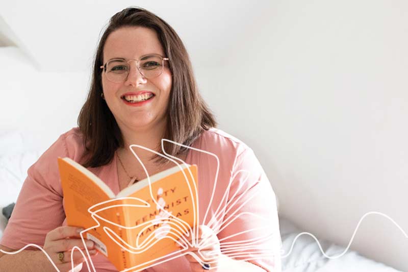 Author smiling with there book