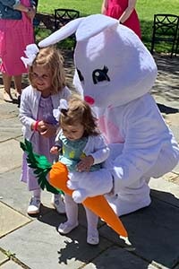 Two kids with the Easter bunny.