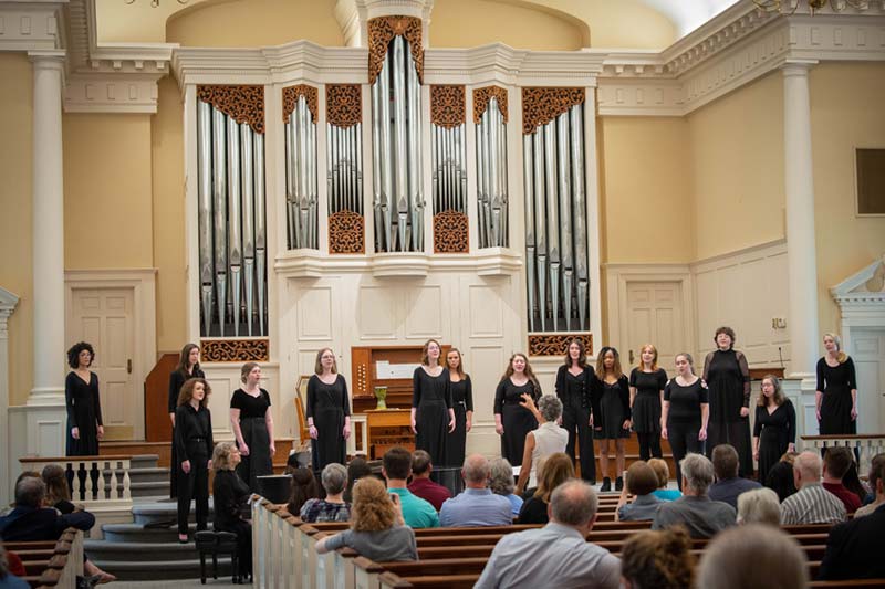 ۲ӰԺ Choral Singing in Jones Chapel in front of live audience.