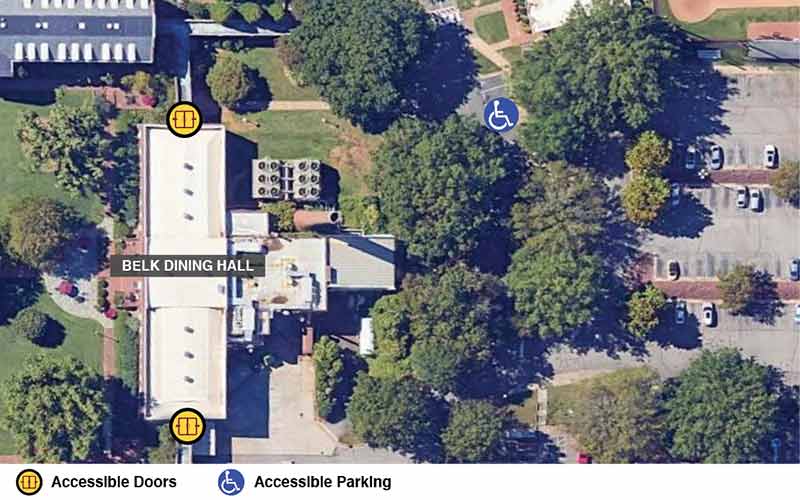 Google earth view of the Belk Dining Hall with icons showing accessible doors and accessible parking.