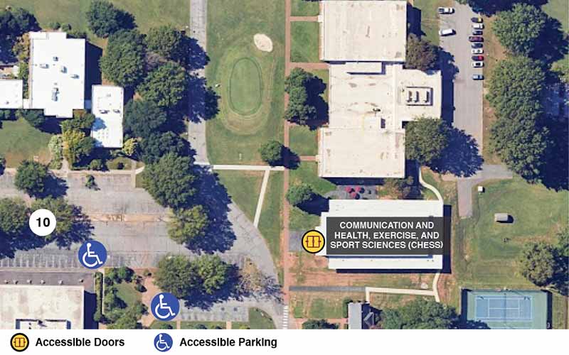 Google earth view of the Communication and health, exercise, and sport sciences building with icons showing accessible doors and accessible parking.