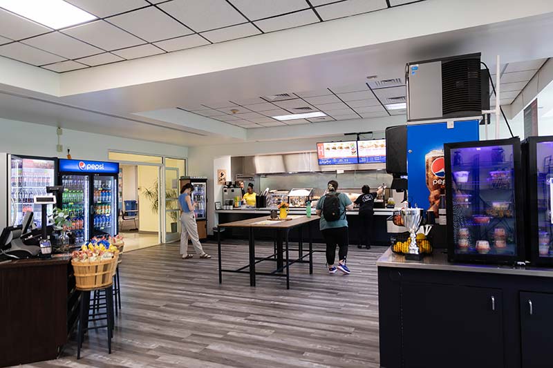 Students in Recently Renovated Beehive ordering food and drinks.